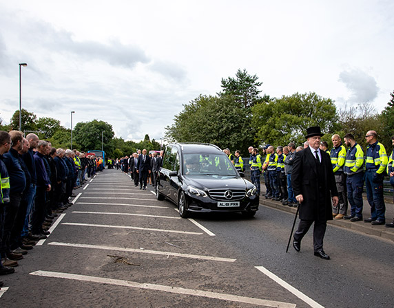 Wrightbus staff form Guard of Honour in tribute to founder Sir William Wright