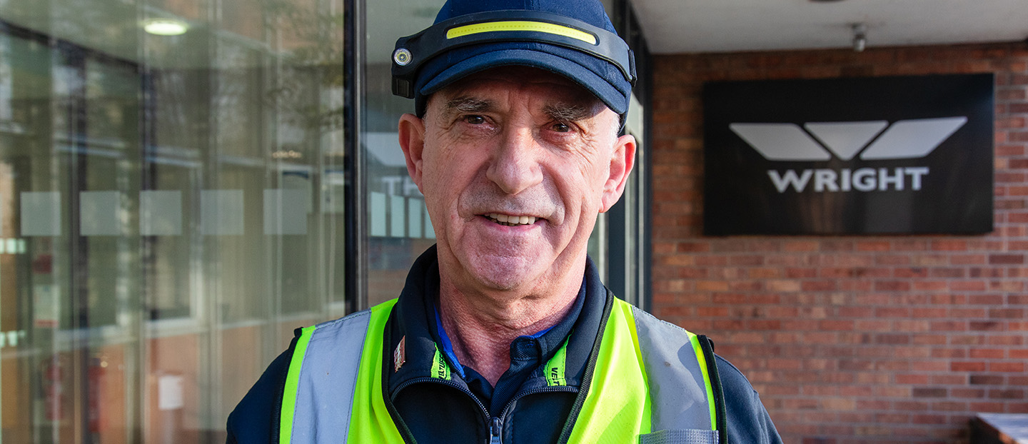 Photo of Norman Stephens outside Wrightbus