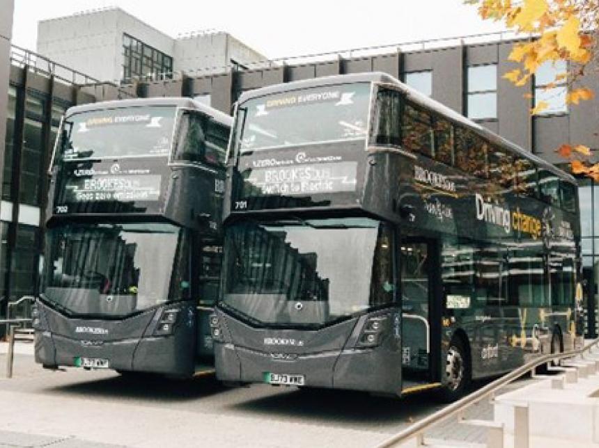 two grey battery electric double deck buses