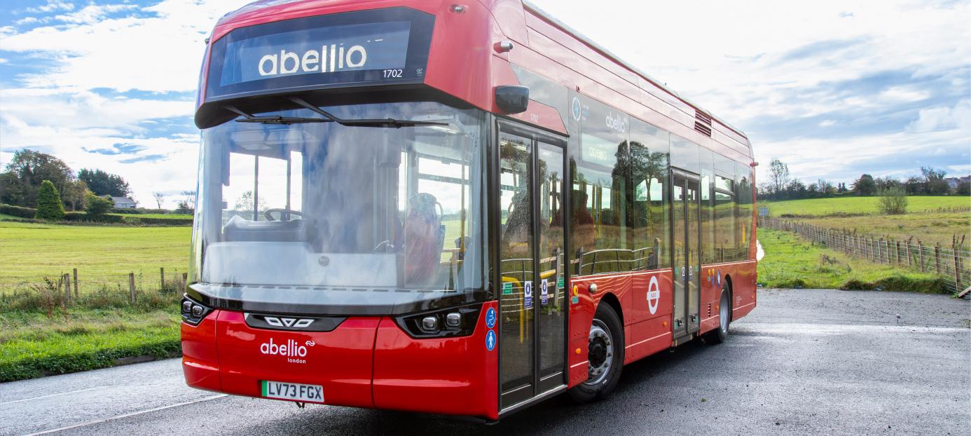 red single deck bus