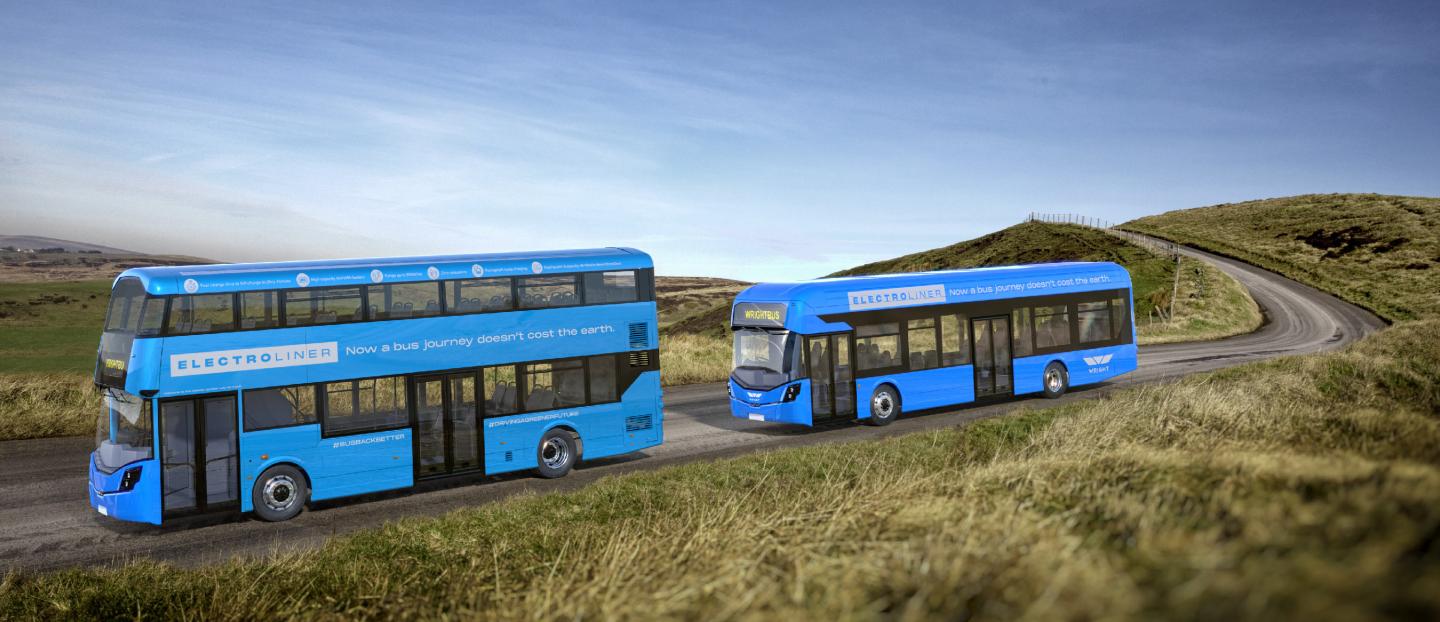 blue double deck and single deck electric buses on a country road