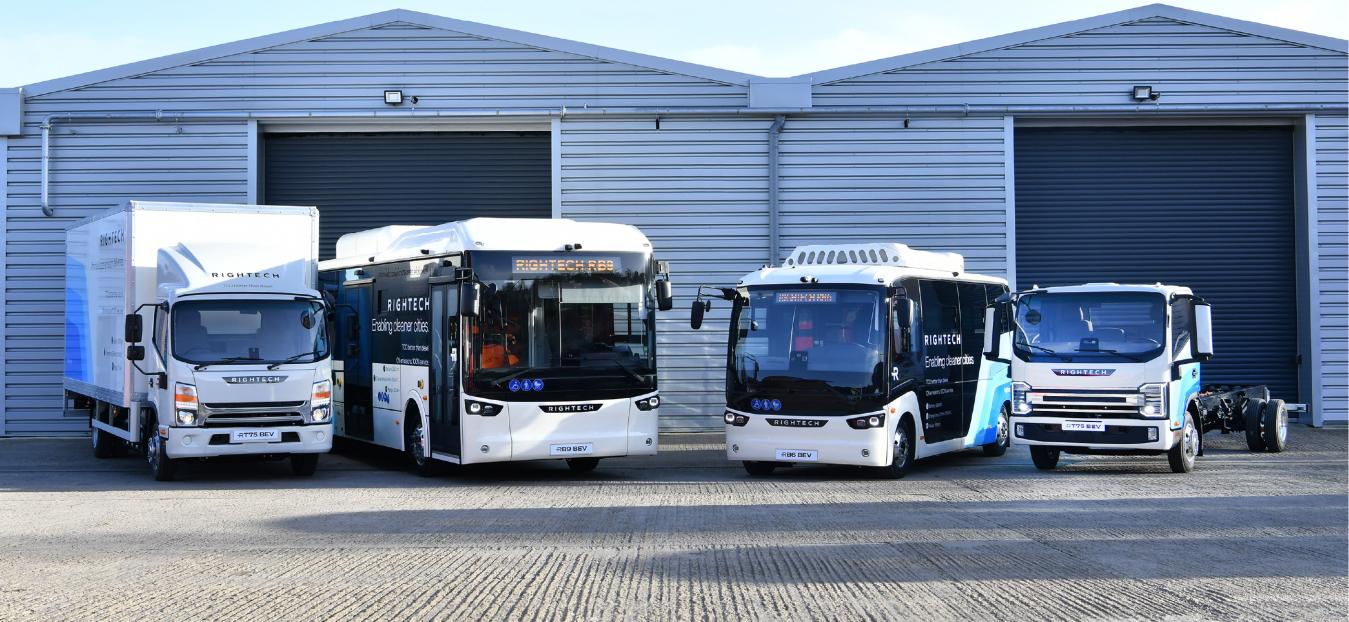 line up of electric buses and trucks