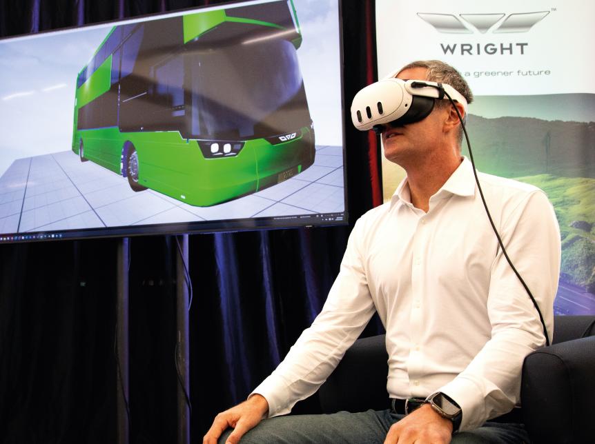 SoS Peter Kyle wearing a VR headset at Wrightbus in Ballymena